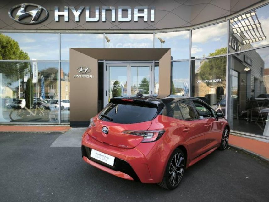 19100 : Hyundai Brive-la-Gaillarde - Garage Pouget - TOYOTA Corolla - Corolla - Rouge Intense métallisé - Traction - Hybride : Essence/Electrique