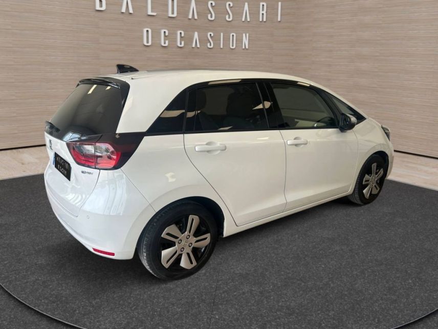 83130 : Hyundai Toulon - Autodif SAS - Groupe BALDASSARI - HONDA JAZZ E:HEV Exclusive - JAZZ IV - Blanc - Automate à fonct. Continu - Essence / Courant électrique