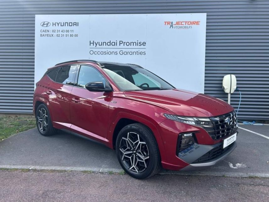 14100 : Hyundai Lisieux - Trajectoire Automobiles - HYUNDAI Tucson - Tucson - Sunset Red Métal/Toit/rétros Black - Traction - Hybride : Essence/Electrique