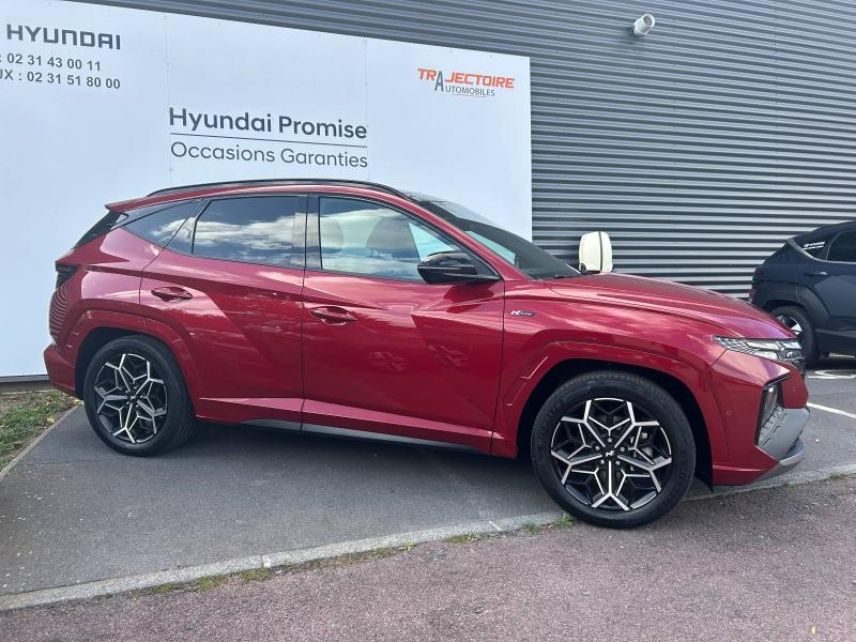 14100 : Hyundai Lisieux - Trajectoire Automobiles - HYUNDAI Tucson - Tucson - Sunset Red Métal/Toit/rétros Black - Traction - Hybride : Essence/Electrique
