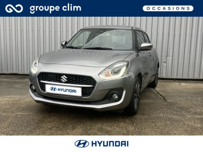 40990 : Hyundai Dax - i-AUTO - SUZUKI Swift - Swift - Premium Silver métallisé - Traction - Essence/Micro-Hybride