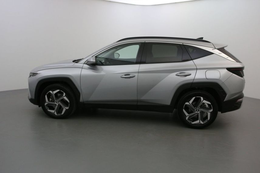 01150 : Stock constructeur - HYUNDAI TUCSON Executive - TUCSON IV - Gris - Boîte automatique - Essence / Courant électrique