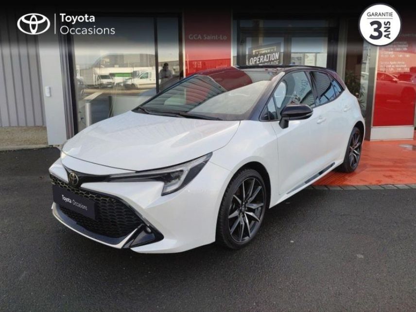 50000 : Hyundai Saint-Lô - GCA - TOYOTA Corolla - Corolla - Blanc Lunaire Nacré Bi-ton - Traction - Hybride : Essence/Electrique