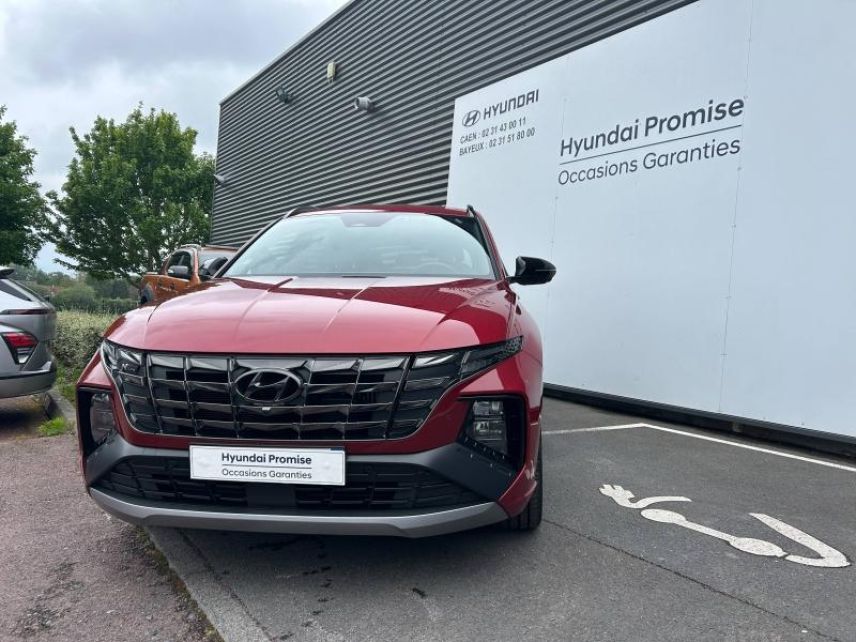 14100 : Hyundai Lisieux - Trajectoire Automobiles - HYUNDAI Tucson - Tucson - Sunset Red Métal - Traction - Hybride : Essence/Electrique