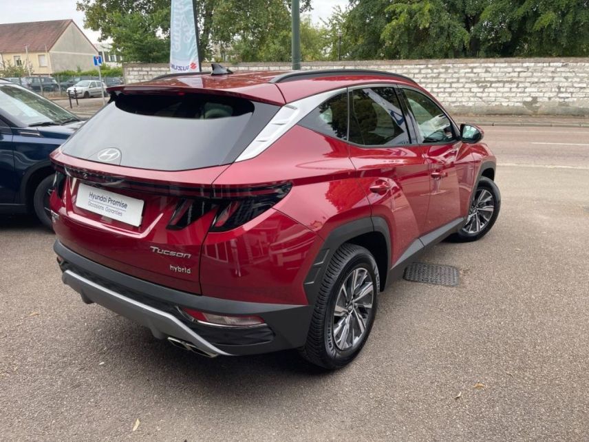 89100 : Hyundai Sens - APS - HYUNDAI Tucson - Tucson - Sunset Red Métal - Traction - Hybride : Essence/Electrique