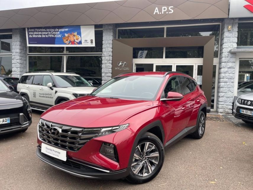 89100 : Hyundai Sens - APS - HYUNDAI Tucson - Tucson - Sunset Red Métal - Traction - Hybride : Essence/Electrique