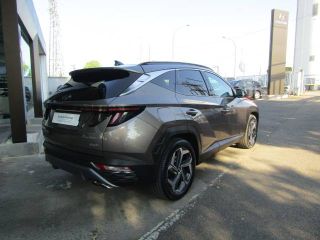 91100 : Hyundai Corbeil-Essonnes - CAP Fournier - HYUNDAI TUCSON Executive - TUCSON IV - Marron - Boîte automatique - Essence / Courant électrique