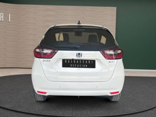 83130 : Hyundai Toulon - Autodif SAS - Groupe BALDASSARI - HONDA JAZZ E:HEV Exclusive - JAZZ IV - Blanc - Automate à fonct. Continu - Essence / Courant électrique