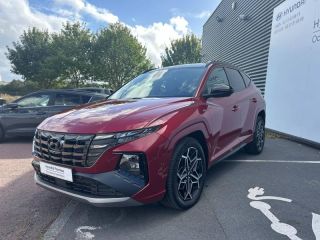 14100 : Hyundai Lisieux - Trajectoire Automobiles - HYUNDAI Tucson - Tucson - Sunset Red Métal/Toit/rétros Black - Traction - Hybride : Essence/Electrique