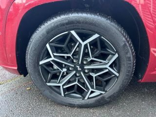 14100 : Hyundai Lisieux - Trajectoire Automobiles - HYUNDAI Tucson - Tucson - Sunset Red Métal - Transmission intégrale - Hybride rechargeable : Essence/Electrique