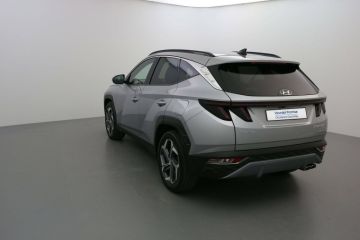 01150 : Stock constructeur - HYUNDAI TUCSON Executive - TUCSON IV - Gris - Boîte automatique - Essence / Courant électrique