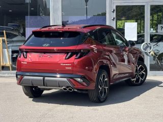 57100 : Hyundai Thionville - Théobald Automobiles - HYUNDAI Tucson - Tucson - Ultimate Red Métal - Traction - Hybride : Essence/Electrique