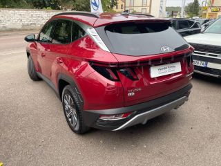 89100 : Hyundai Sens - APS - HYUNDAI Tucson - Tucson - Sunset Red Métal - Traction - Hybride : Essence/Electrique