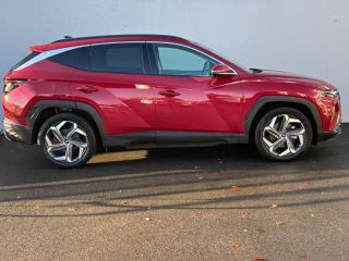 56000 : Hyundai Vannes - Park Lann Automobiles - HYUNDAI Tucson - Tucson - Sunset Red Métal - Transmission intégrale - Hybride rechargeable : Essence/Electrique