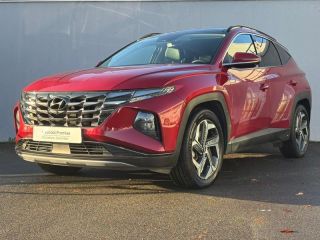 56000 : Hyundai Vannes - Park Lann Automobiles - HYUNDAI Tucson - Tucson - Sunset Red Métal - Transmission intégrale - Hybride rechargeable : Essence/Electrique