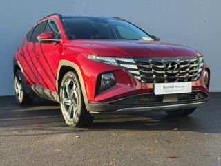 56000 : Hyundai Vannes - Park Lann Automobiles - HYUNDAI Tucson - Tucson - Sunset Red Métal - Transmission intégrale - Hybride rechargeable : Essence/Electrique