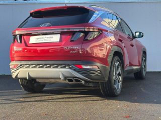 56000 : Hyundai Vannes - Park Lann Automobiles - HYUNDAI Tucson - Tucson - Sunset Red Métal - Transmission intégrale - Hybride rechargeable : Essence/Electrique