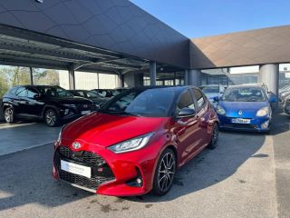 64100 : Hyundai Bayonne - Oceanic Auto - TOYOTA Yaris - Yaris - Bi-ton Rouge Intense / Toit noir - Traction - Hybride : Essence/Electrique
