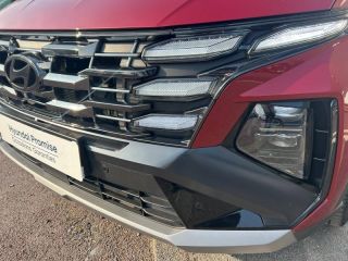 14100 : Hyundai Lisieux - Trajectoire Automobiles - HYUNDAI Tucson - Tucson - Ultimate Red Métal - Traction - Hybride : Essence/Electrique