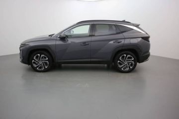 01150 : Stock constructeur - HYUNDAI TUCSON Executive - TUCSON IV - Gris - Boîte automatique - Essence / Courant électrique